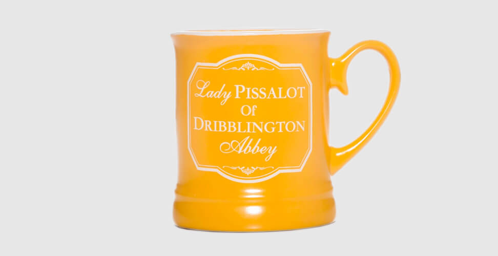 Mustard novelty mug with 'Lady Pissalot of Dribblington Abbey' slogan &ndash; funny adult gag gift for tea, coffee, or bachelorette parties
