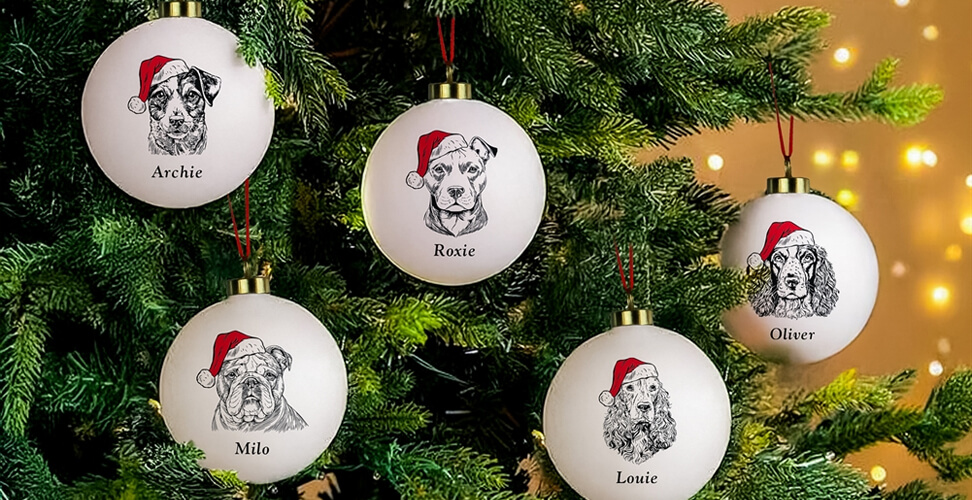 Personalised white Christmas baubles with dog breed illustrations wearing Santa hats