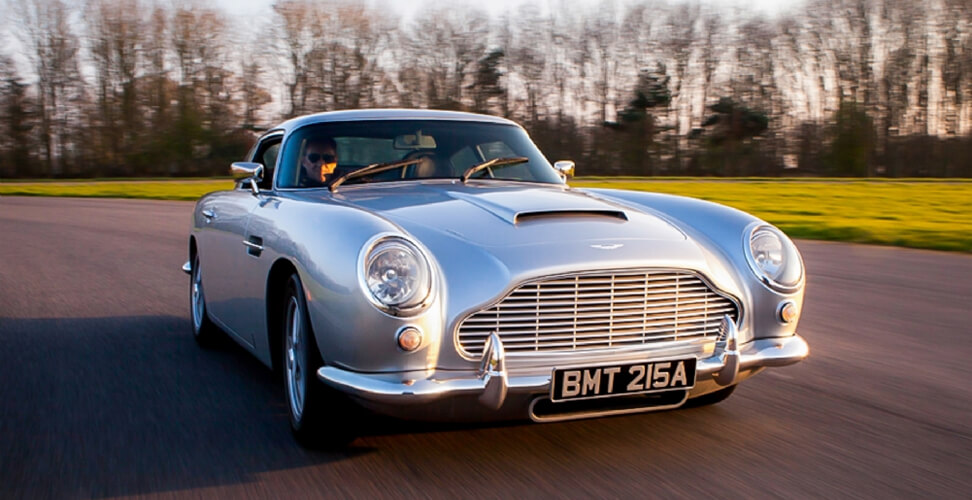 Aston Martin DB5 on race track &ndash; James Bond driving experience, luxury sports car thrill for him