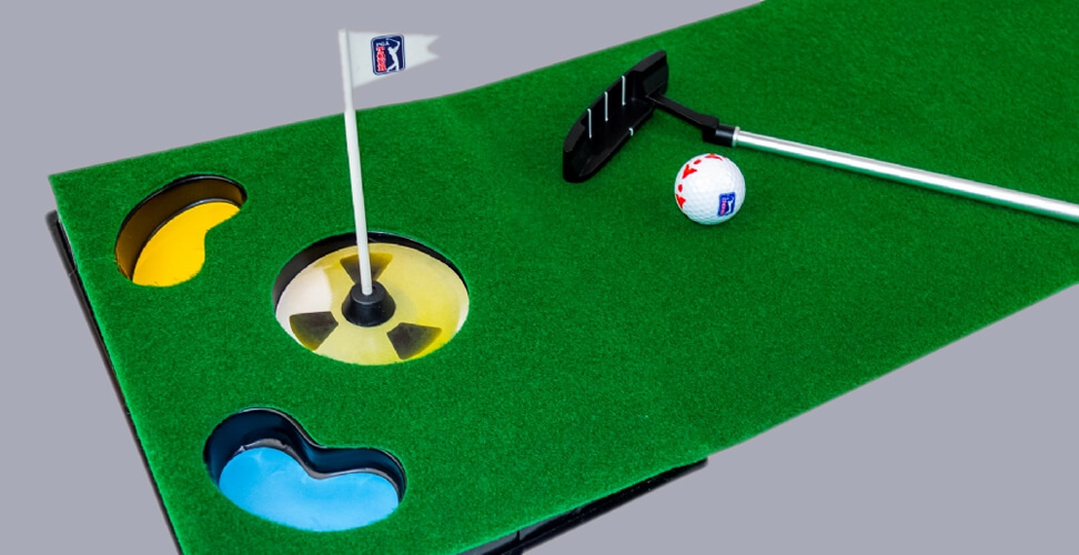 Close up of PGA Tour 6FT Office Putting Mat with collapsible putter