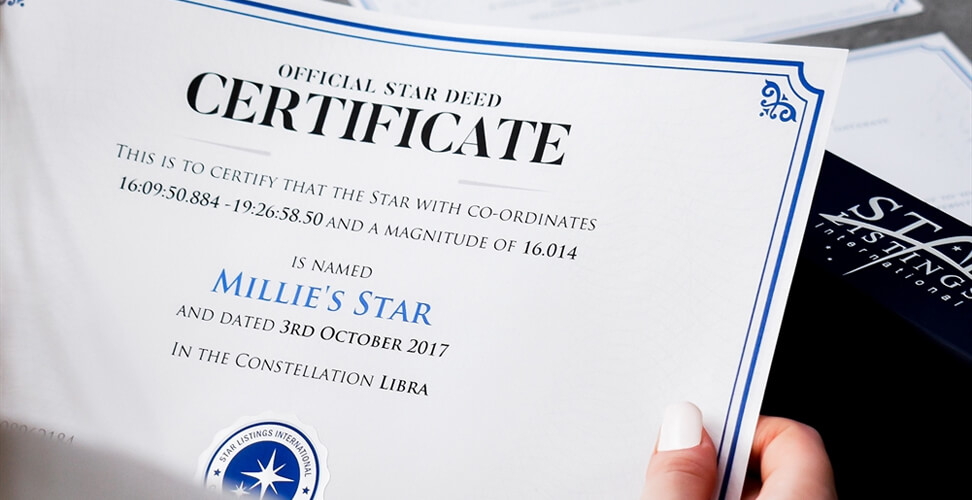 Woman holding a Name a Star certificate &ndash; unique sentimental gift idea for her