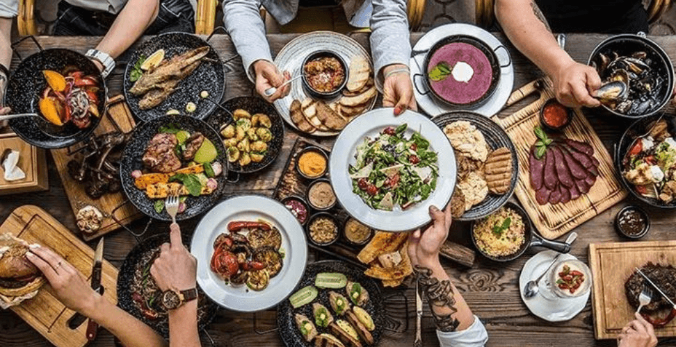 A group of people eating food