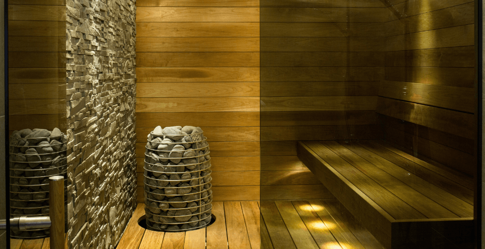 A wooden room with a basket of rocks