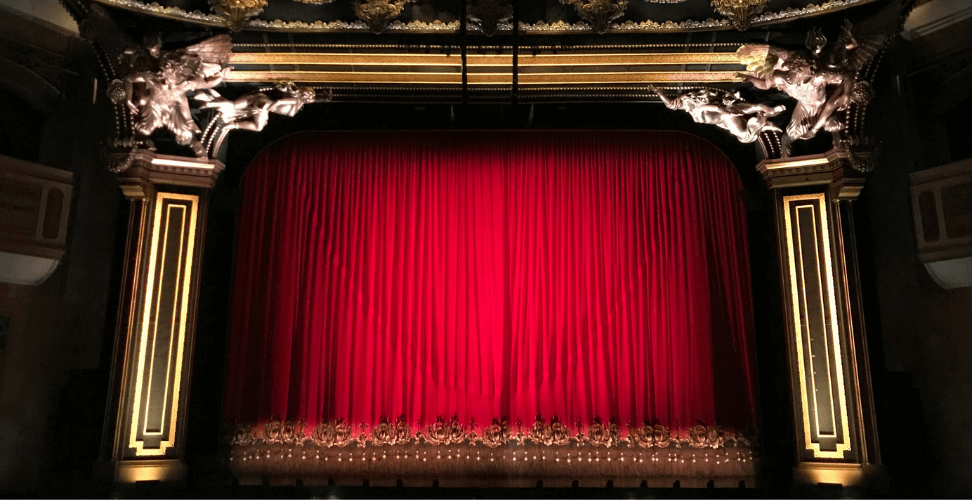 A red curtain on a stage