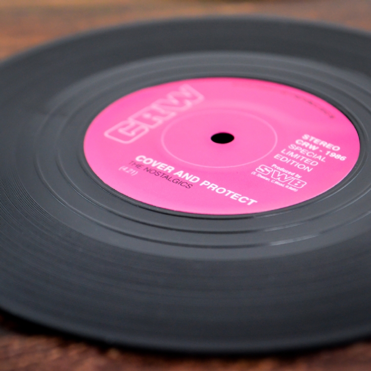 Destination - Set di 2 sottobicchieri rotondi in vinile con scritta