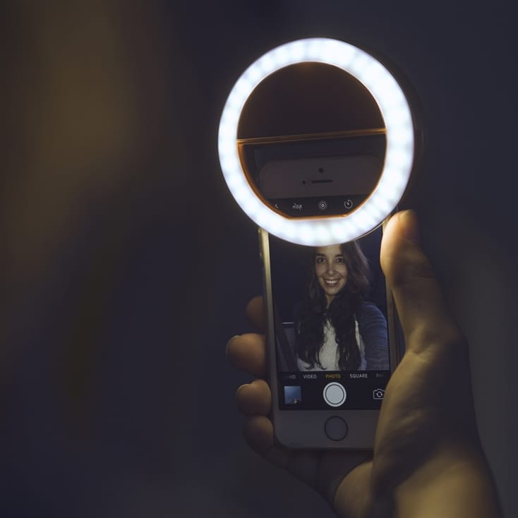 Selfie light outlet for phone