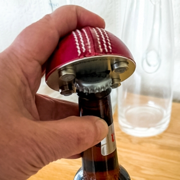 Half Cricket Ball Bottle Opener