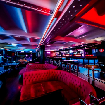 Boutique Bowling for Four at Play At Pins (1 games + Drink)