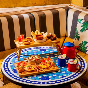 Afternoon Tea for Two with a Teapot Cocktail at Revolucíon de Cuba