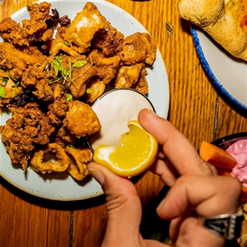 Small Plates & Cocktail at Revolution Bars