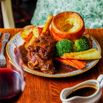 Traditional Sunday Roast with a Glass of Wine for Two