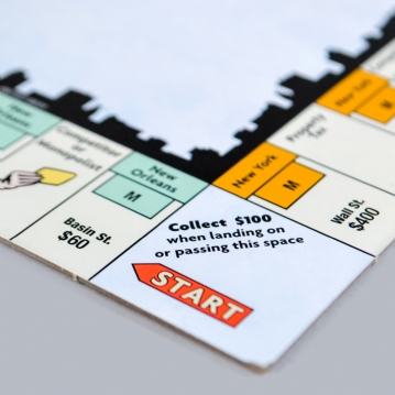 Anti-Monopoly Board Game Tin 