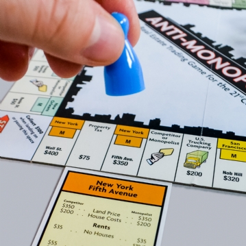 Anti-Monopoly Board Game Tin 