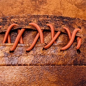 Distressed Faux Leather Football Doorstop