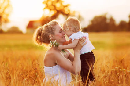 Mother and Son playing in a field
